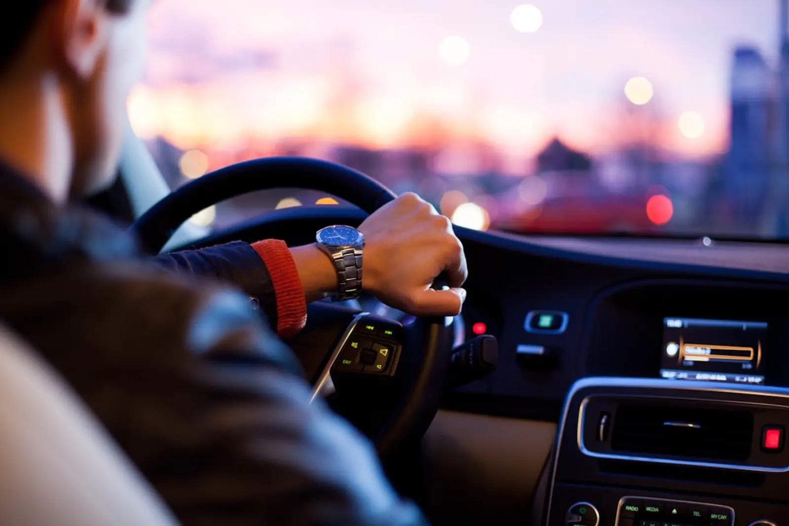 Comfortable, professional taxi ride at dusk